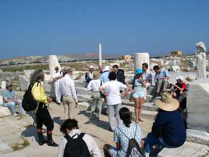 a group of participants in Delos